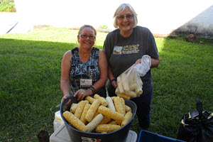 CornShuckingVolunteers300X200